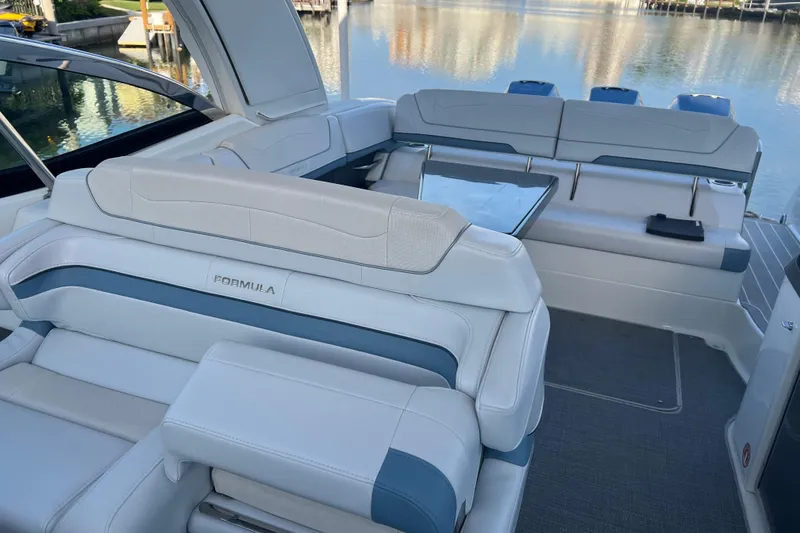 Slide: The Image of 2019 Formula 350 Crossover Bowrider I/O with luxurious seating and sleek design. - 45