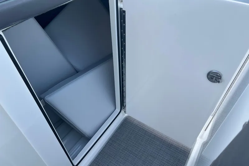 Slide: The Image of 2019 Formula 350 Crossover Bowrider I/O cabin interior with cushioned seating. - 54