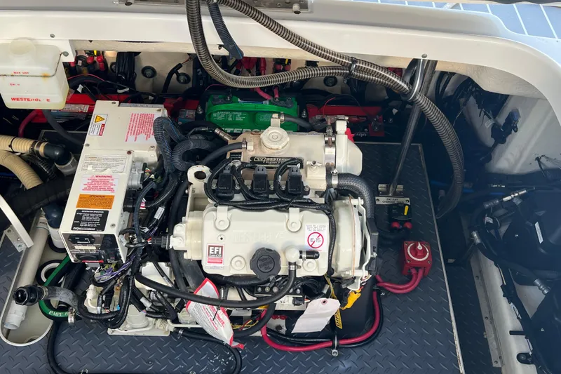 Slide: The Image of Engine compartment of a 2019 Formula 350 Crossover Bowrider I/O boat. - 68
