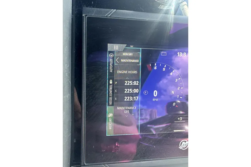 Slide: The Image of Dashboard display of a 2019 Formula 350 Crossover Bowrider I/O showing engine hours and RPM. - 8