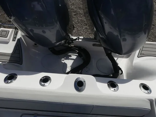 Slide: The Image of Rear view of 2023 Sea Fox 268 Commander with dual outboard engines. - 33