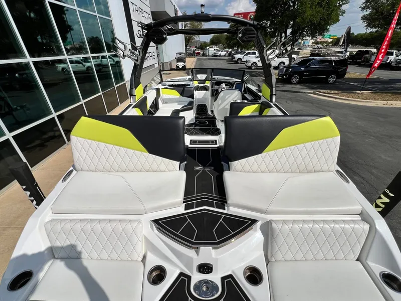 Slide: The Image of 2023 Tigé Z3 boat with modern seating and stylish design. - 11