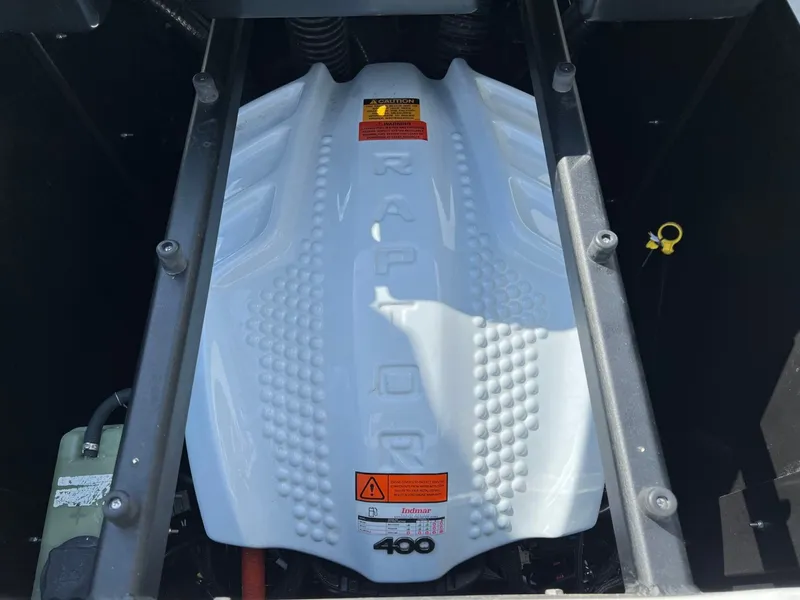 Slide: The Image of Engine cover of 2023 Tigé Z3 with Raptor 400 logo. - 18