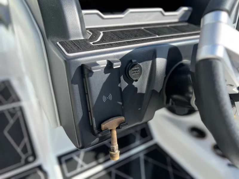 Slide: The Image of Close-up of a 2023 Tigé Z3 boat dashboard. - 21