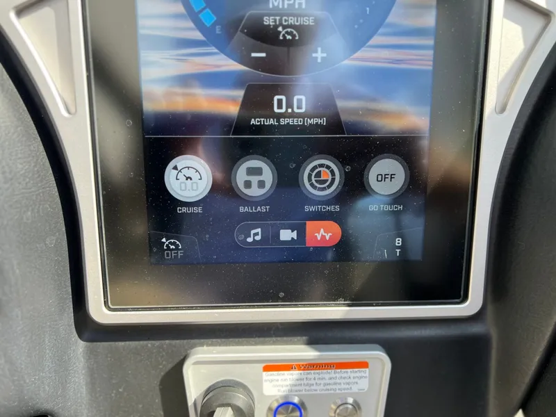 Slide: The Image of 2023 Tigé Z3 boat display with speed and ballast controls. - 26