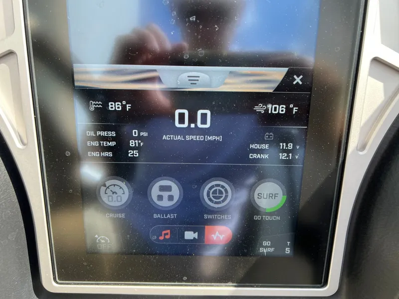 Slide: The Image of 2023 Tigé Z3 dashboard displaying temperature and speed settings. - 31