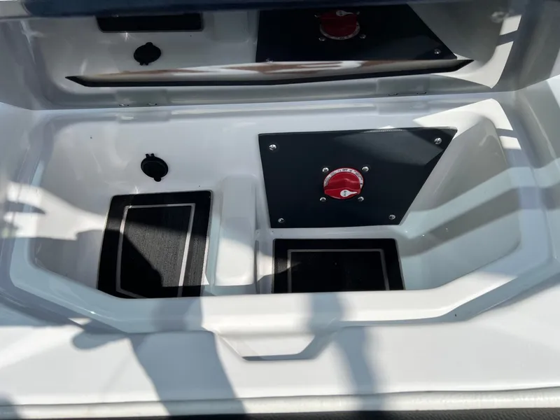 Slide: The Image of Interior of 2023 Tigé Z3 boat with storage compartment and switch. - 36