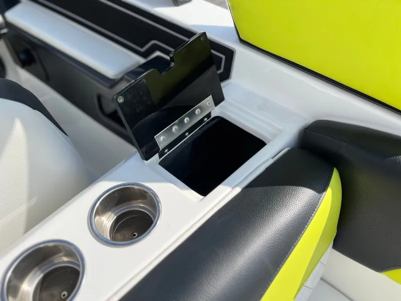 Slide: The Image of 2023 Tigé Z3 interior with cup holders and storage compartment. - 39