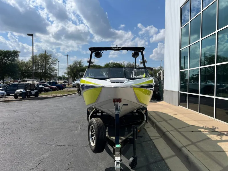 Slide: The Image of 2023 Tigé Z3 boat on trailer outside a building. - 7