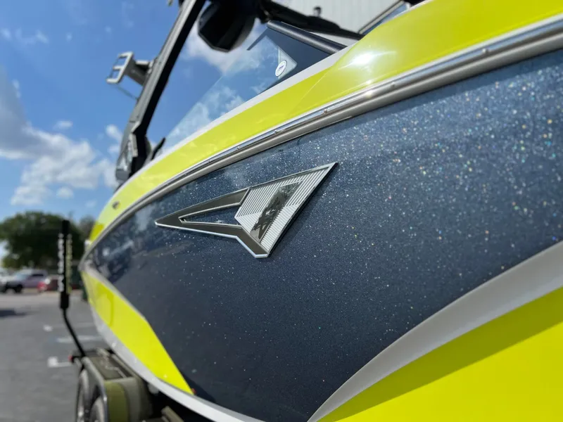 Slide: The Image of Close-up of a 2023 Tigé Z3 boat with sparkling design. - 8