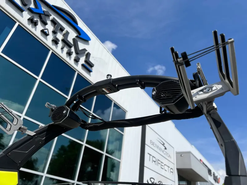 Slide: The Image of 2023 Tigé Z3 boat at a marine dealership. - 9