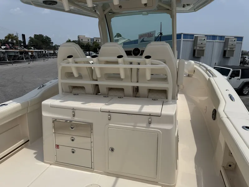 Slide: The Image of 2026 Grady-White Canyon 326 featuring a spacious cockpit and comfortable seating. - 14