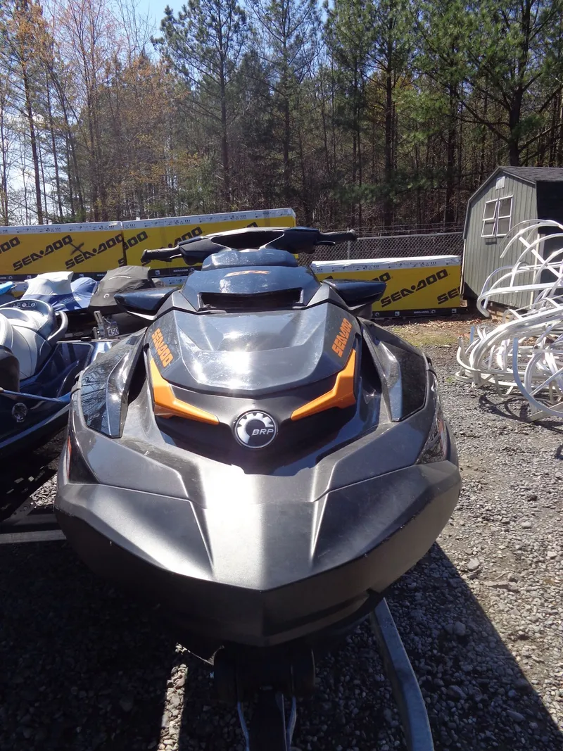 Slide: The Image of 2023 Sea-Doo GTX 170 IBR jet ski parked outdoors. - 12