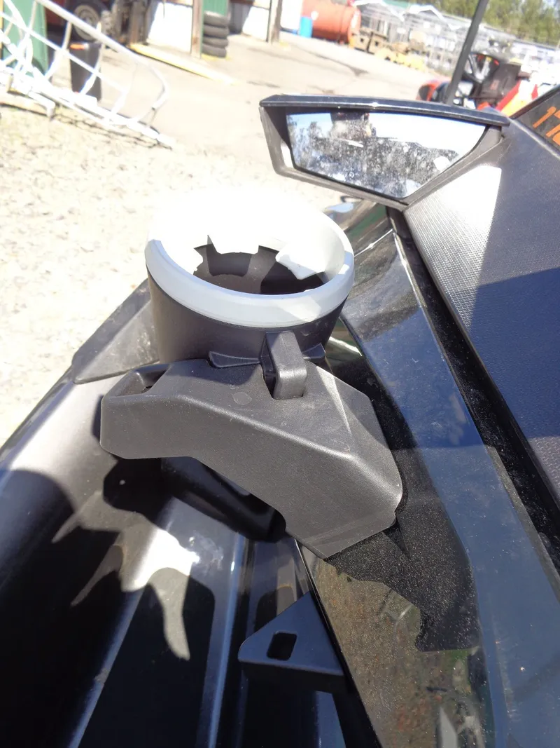 Slide: The Image of Close-up of a 2023 Sea-Doo GTX 170 IBR cup holder. - 15