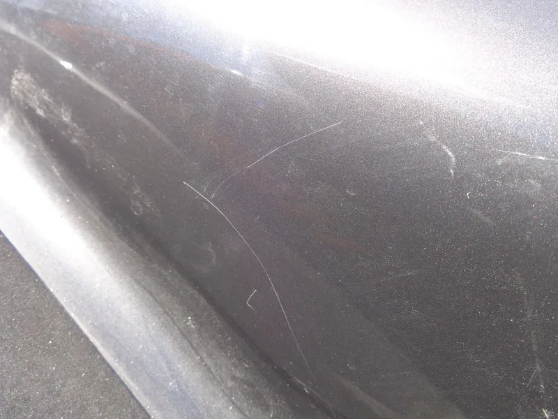 Slide: The Image of Close-up of scratches on a 2023 Sea-Doo GTX 170 IBR. - 20