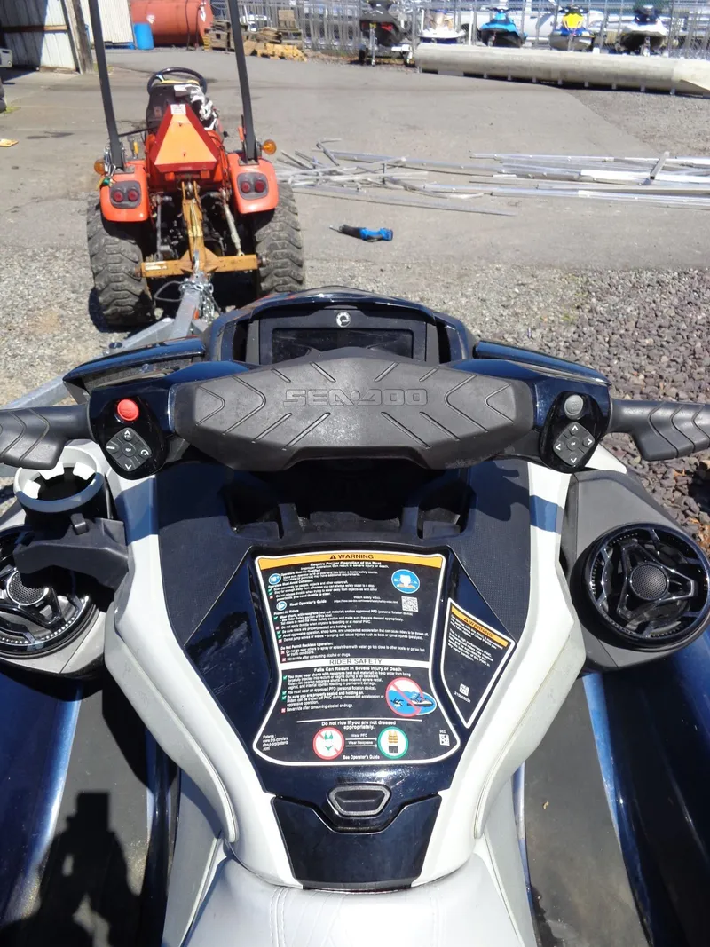 Slide: The Image of 2023 Sea-Doo GTX Limited 300 iDF on trailer, cockpit close-up. - 12
