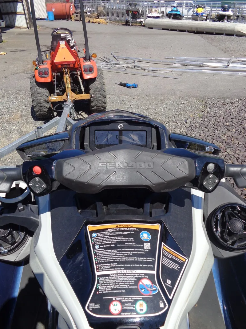Slide: The Image of 2023 Sea-Doo GTX Limited 300 iDF with tractor in background. - 19