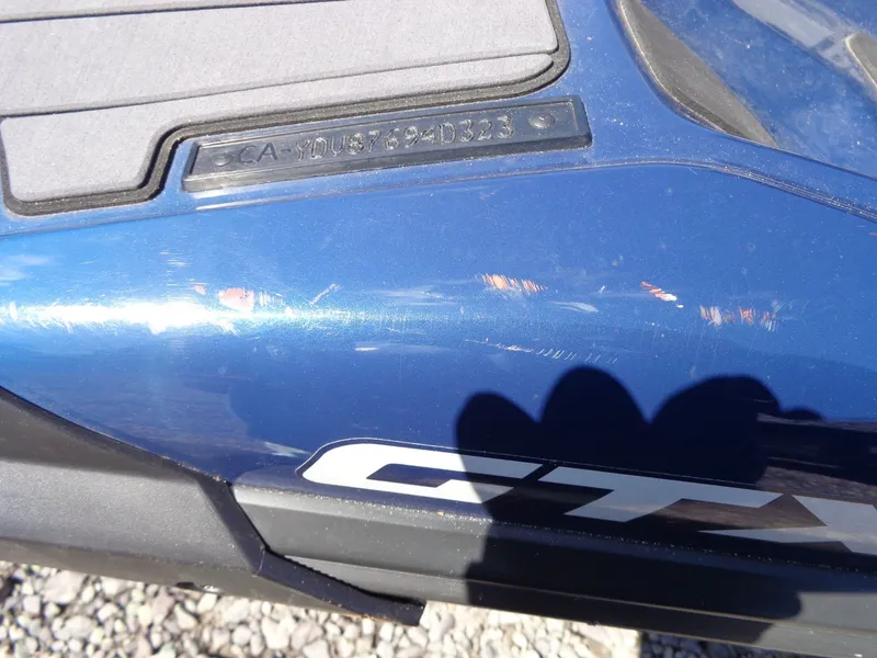 Slide: The Image of Close-up of a blue 2023 Sea-Doo GTX Limited 300. - 23