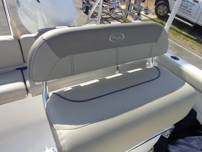 Slide: The Image of 2023 Key West 189 FS boat seat with Yamaha engine in background. - 13
