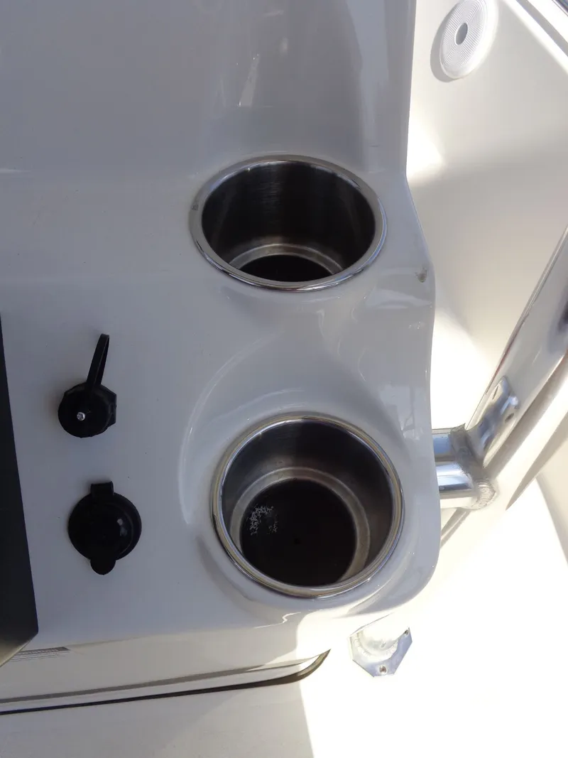 Slide: The Image of Key West 189 FS 2023 boat console with cup holders. - 18