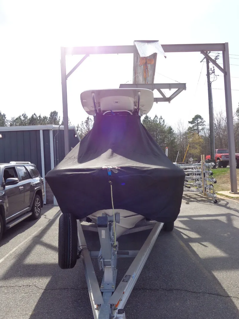 Slide: The Image of 2023 Key West 189 FS boat with cover on trailer. - 24