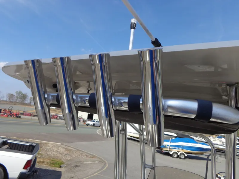 Slide: The Image of Key West 189 FS 2023 boat with fishing rod holders. - 46