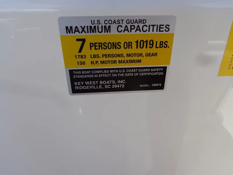 Slide: The Image of USCG capacity label for Key West 189 FS boat, 2023 model. - 49