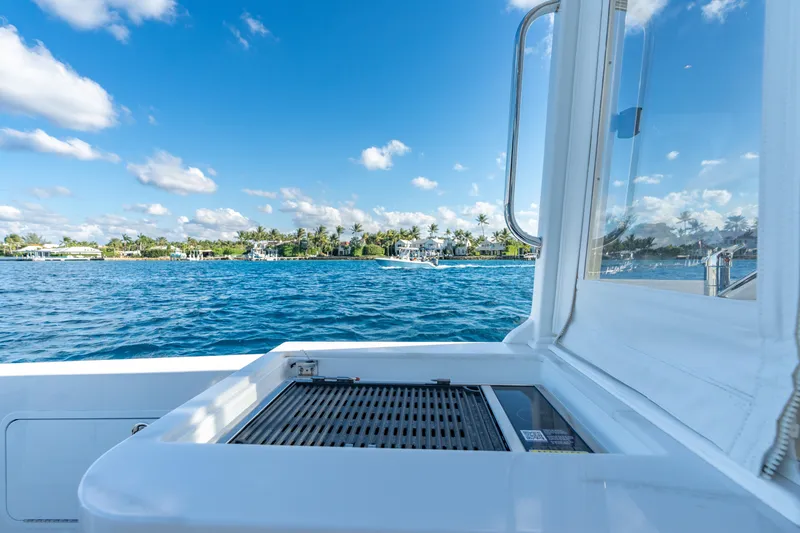 Slide: The Image of MJM 38RS 2026 yacht with ocean view and clear blue sky. - 14
