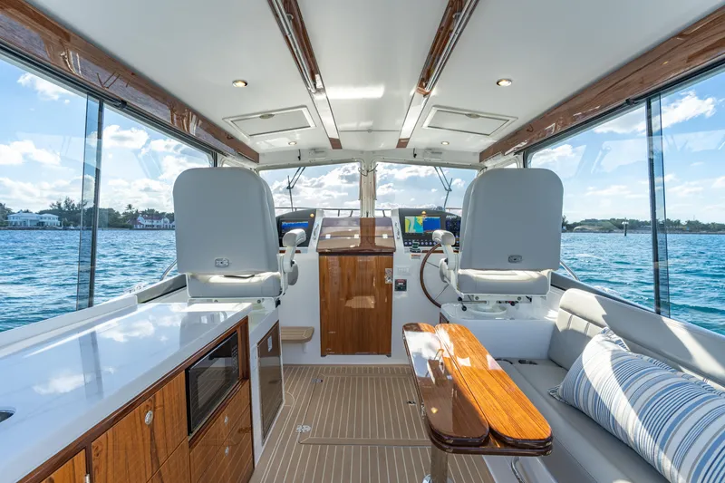 Slide: The Image of Luxurious interior of 2026 MJM 38RS yacht with modern seating and ocean view. - 5