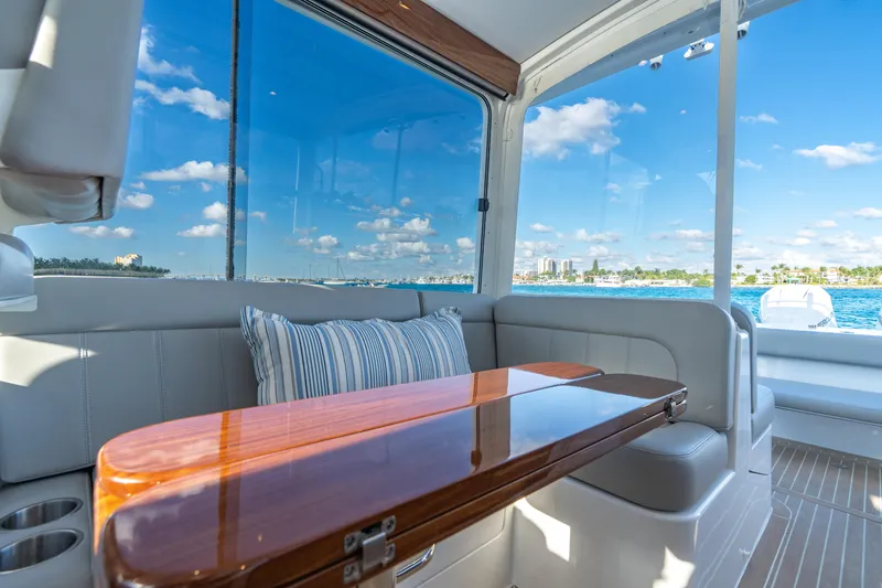 Slide: The Image of Luxurious interior of 2026 MJM 38RS yacht with ocean view and elegant seating. - 7
