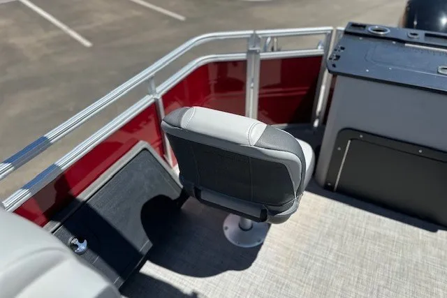 Slide: The Image of 2026 Sun Tracker Sportfish 24 XP3 boat interior with seating and control panel. - 118