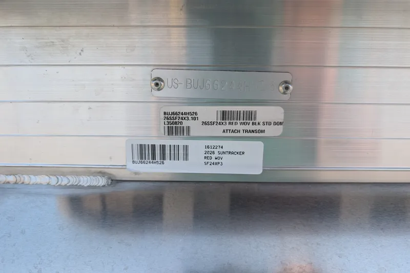 Slide: The Image of 2026 Sun Tracker Sportfish 24 XP3 identification plate with serial numbers and model details. - 114