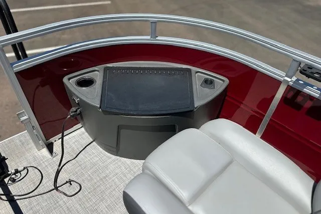 Slide: The Image of 2026 Sun Tracker Sportfish 24 XP3 boat interior with seating and control panel. - 20