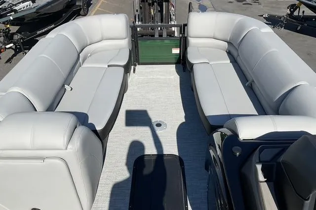 Slide: The Image of 2026 Regency 230 DL boat interior with spacious seating and modern design. - 4