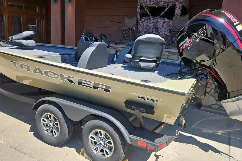 The Image of 2026 Tracker Pro Team 195 boat with Mercury Pro XS engine on trailer. - 0