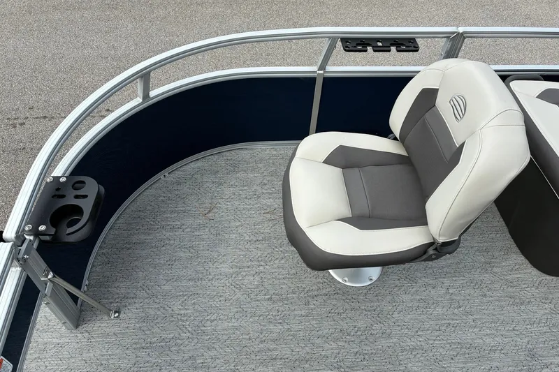Slide: The Image of 2026 Sun Tracker Bass Buggy 16 XL Select boat seat with cup holder on deck. - 13