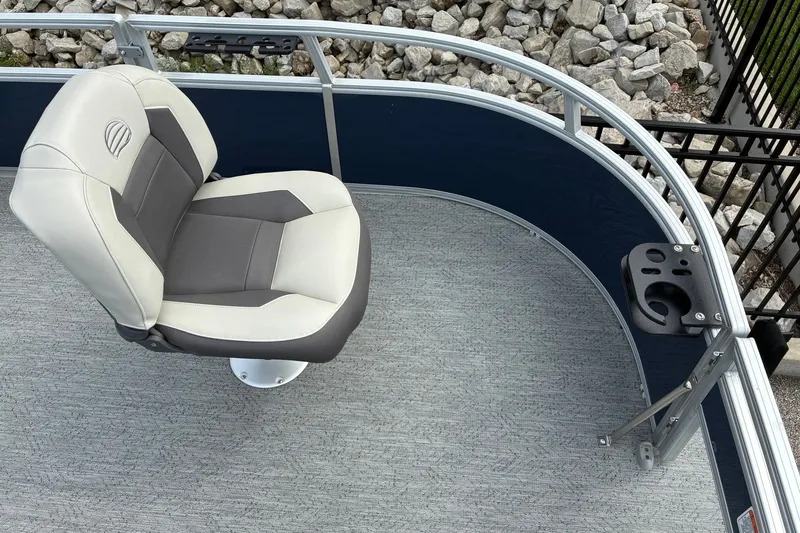 Slide: The Image of 2026 Sun Tracker Bass Buggy 16 XL Select boat seat with cup holder, gray and white upholstery. - 12