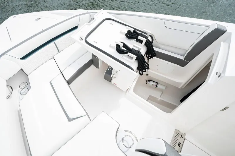 Slide: The Image of Manufacturer Provided Image: 2020 Tiara Sport 34 LX boat interior with seating and storage compartments. - 5