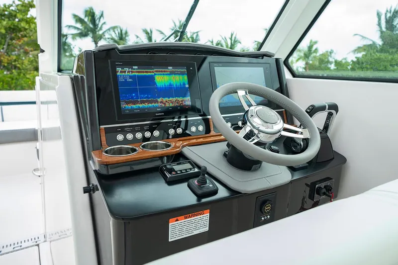 Slide: The Image of Manufacturer Provided Image: 2020 Tiara Sport 34 LX helm station with advanced navigation displays. - 8