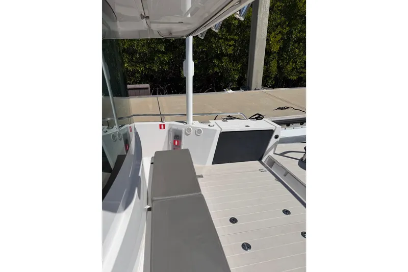 Slide: The Image of 2018 Axopar 37 Cabin boat interior with sleek seating and modern design. - 12