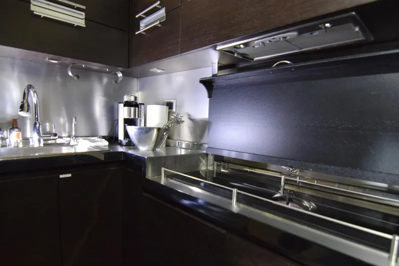 Slide: The Image of Modern kitchen in a 2010 Azimut 62S yacht with stainless steel appliances. - 25