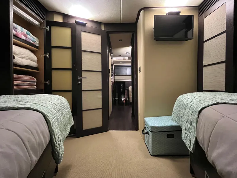 Slide: The Image of Interior cabin of 2010 Azimut 62S yacht with twin beds and modern decor. - 36