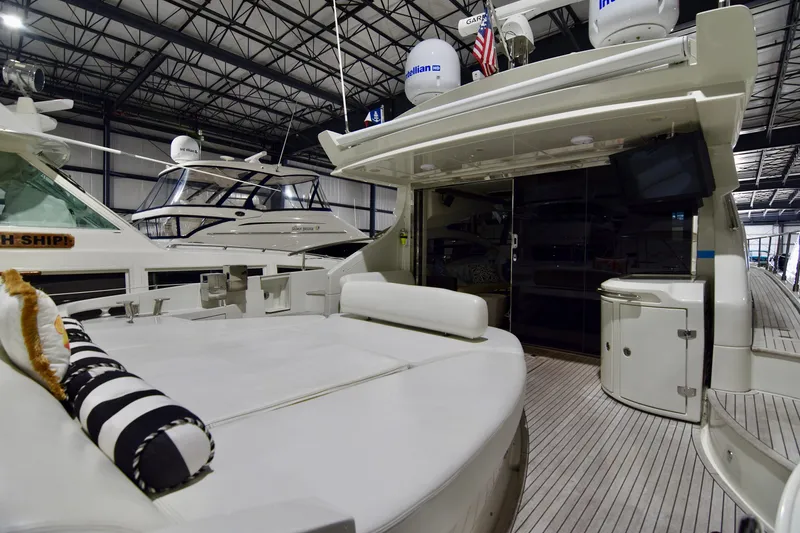 Slide: The Image of 2010 Azimut 62S yacht interior with spacious deck and modern amenities. - 5