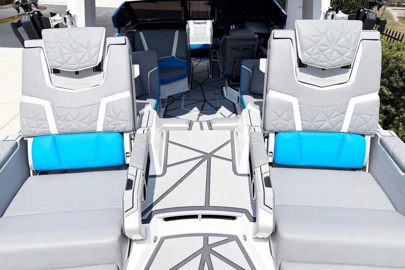 Slide: The Image of 2025 Nautique Super Air Nautique G25 Paragon interior with luxurious seating and modern design. - 9