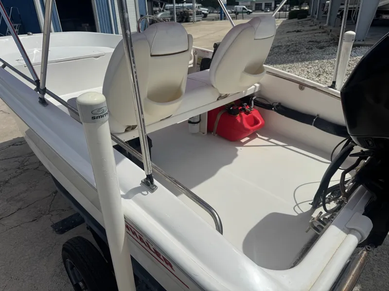 Slide: The Image of 2009 Boston Whaler 13 Sport boat interior with seating bench. - 4