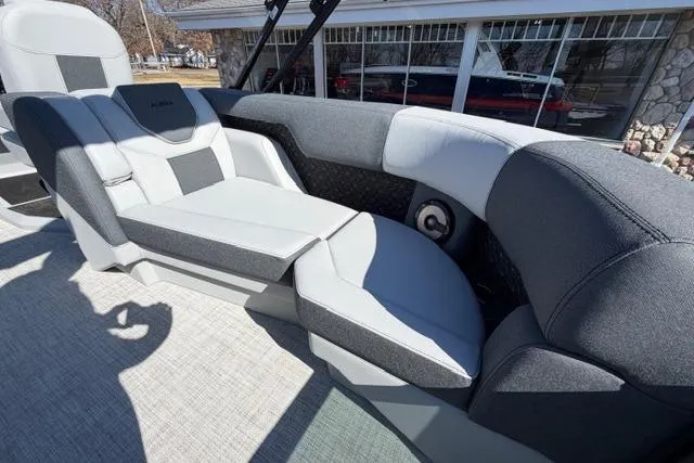 Slide: The Image of Luxurious seating on 2026 Alera M 23Q boat, featuring modern design and comfort. - 16