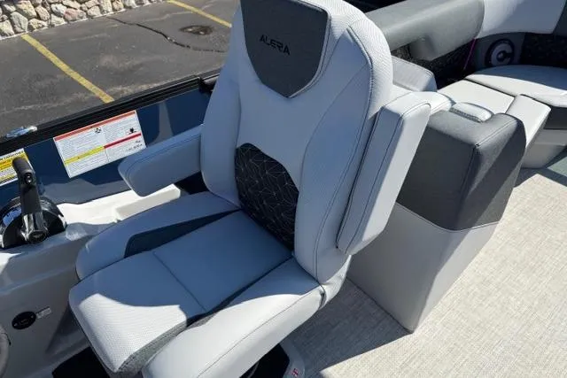 Slide: The Image of Alera M 23Q 2026 boat seat with modern design and comfortable armrests. - 23