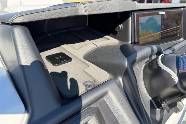 Slide: The Image of Dashboard of 2026 Alera M 23Q with touchscreen and wireless charging pad. - 27