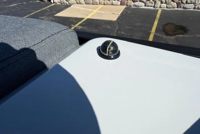 Slide: The Image of Alera M 23Q 2026 model detail with a rooftop component in a parking lot setting. - 30