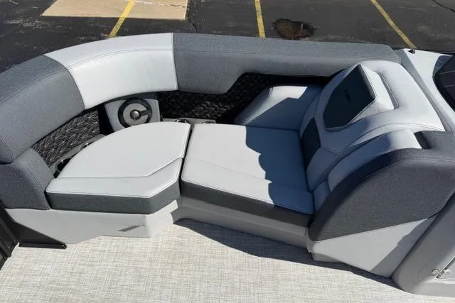 Slide: The Image of Luxurious seating on the 2026 Alera M 23Q boat, featuring sleek gray upholstery. - 34